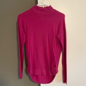 Pink turtleneck sweater